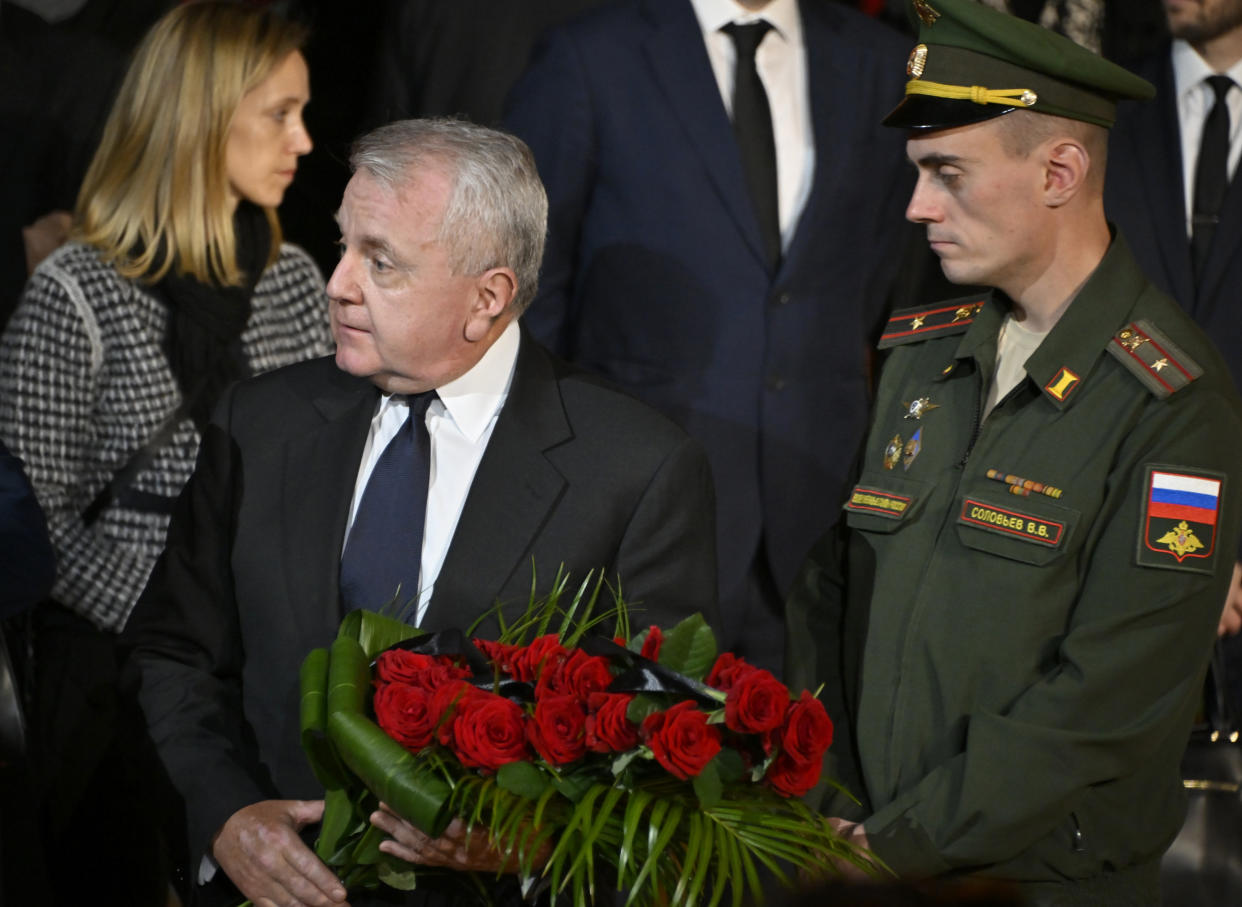 US ambassador to Russia John Joseph Sullivan, centre, walks to the coffin of former Soviet President Mikhail Gorbachev inside the Pillar Hall of the House of the Unions during a farewell ceremony in Moscow, Russia, Saturday, Sept. 3, 2022. Gorbachev, who died Tuesday at the age of 91, will be buried at Moscow's Novodevichy cemetery next to his wife, Raisa, following a farewell ceremony at the Pillar Hall of the House of the Unions, an iconic mansion near the Kremlin that has served as the venue for state funerals since Soviet times. (Alexander Nemenov/Pool Photo via AP)