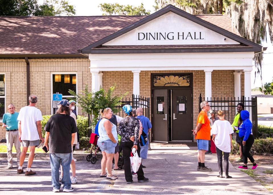 On May 11, after a two-year closure due to COVID-19, the Salvation Army's downtown dining hall at the Center of Hope reopened. During the shutdown, takeout meals were provided. The people here, who lined up for the first meal in the reopened hall, were glad to once again be eating and socializing together.