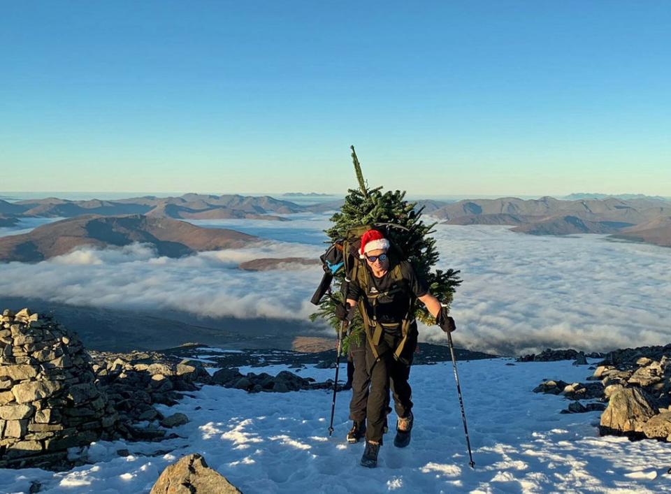 Ed Jackson, a quadriplegic former rugby union star, has carried a Christmas tree to the summit of Ben Nevis for charity (Ed Jackson/PA)