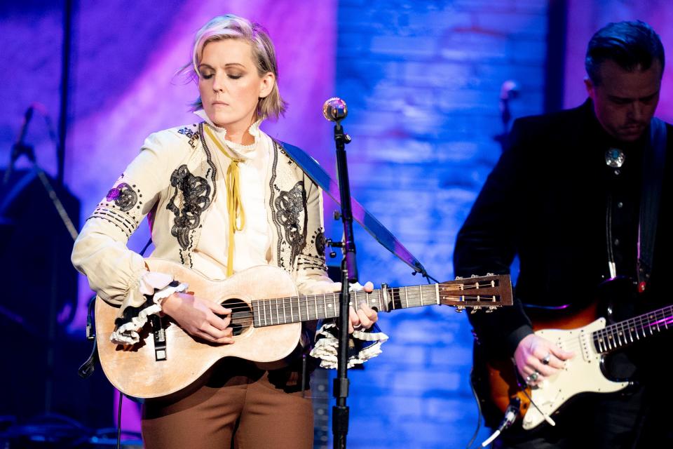 Brandi Carlile performs with The Highwomen during the Americana Music Association Awards ceremony at the Ryman Auditorium Wednesday, Sept. 22, 2021 in Nashville, Tenn. Jason Isbell is on guitar behind her.