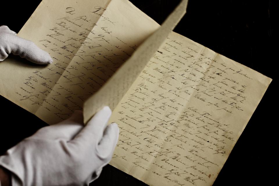 A newly found manuscript of a fairy tale by Hans Christian Andersen which has been located in Odense, pictured in the State Archives in Copenhagen, Denmark Wednesday, Dec. 12, 2012. The story of ‘The Tallow Candle’ might have been written about 1823, when he was 18 year old. (AP Photo/POLFOTO, Martin Bubandt) DENMARK OUT