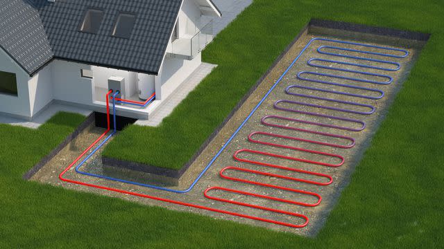 <p>KangeStudio / Getty Images</p> Schematic of a ground-source heat pump.