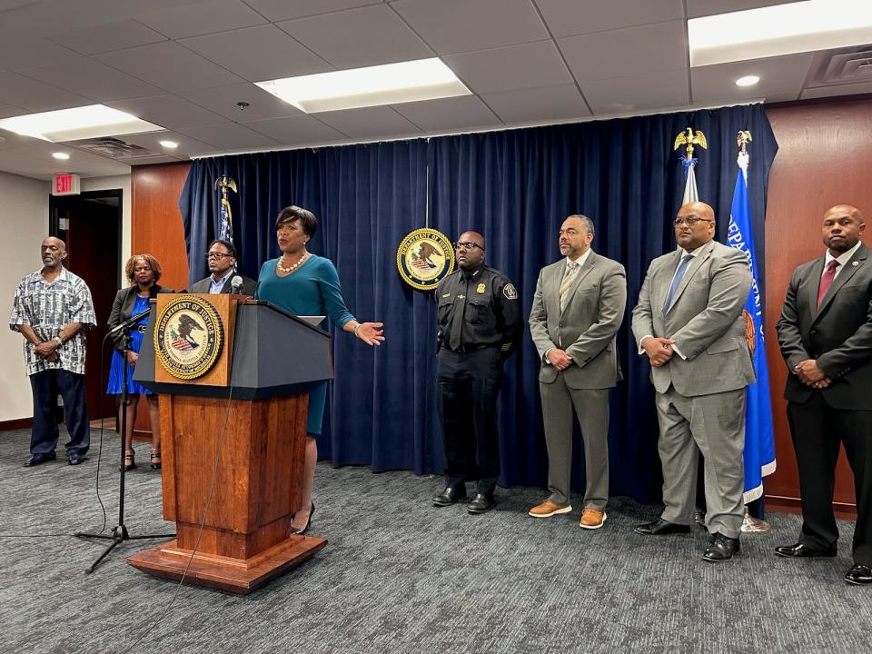 U.S. Attorney Dawn Ison, center, speaks during a news conference May 23, 2024 at her office in downtown Detroit about the summer enforcement initiative in two city precincts and city parks from Memorial Day to Labor Day.