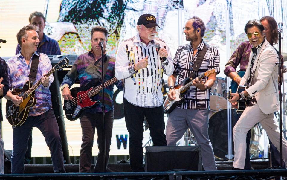 Current line-up: Brian Eichenberger, Tim Bonhomme, Keith Hubacher, Mike Love, Christian Love, John Stamos, and Scott Totten perform in 2021 - Daniel Knighton/Getty Images