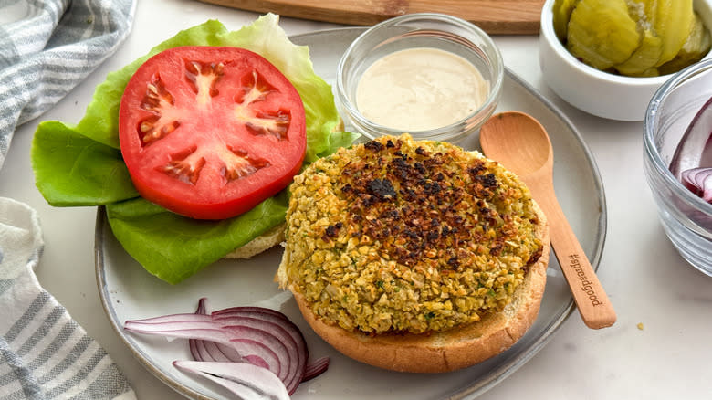 Open falafel burger with toppings