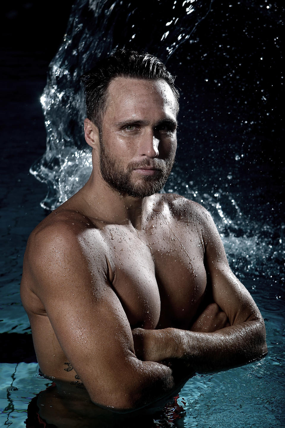 GOLD COAST, AUSTRALIA - JULY 06: (EDITORS NOTE: Image has been desaturated) Australian Olympic Games swimmer and ironman Ky Hurst poses during a portrait session on July 6, 2012 in Gold Coast, Australia. (Photo by Chris Hyde/Getty Images)