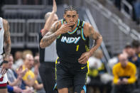 Indiana Pacers forward Obi Toppin (1) reacts after scoring during the first half of an NBA basketball game against the Miami Heat in Indianapolis, Sunday, April 7, 2024. (AP Photo/Doug McSchooler)