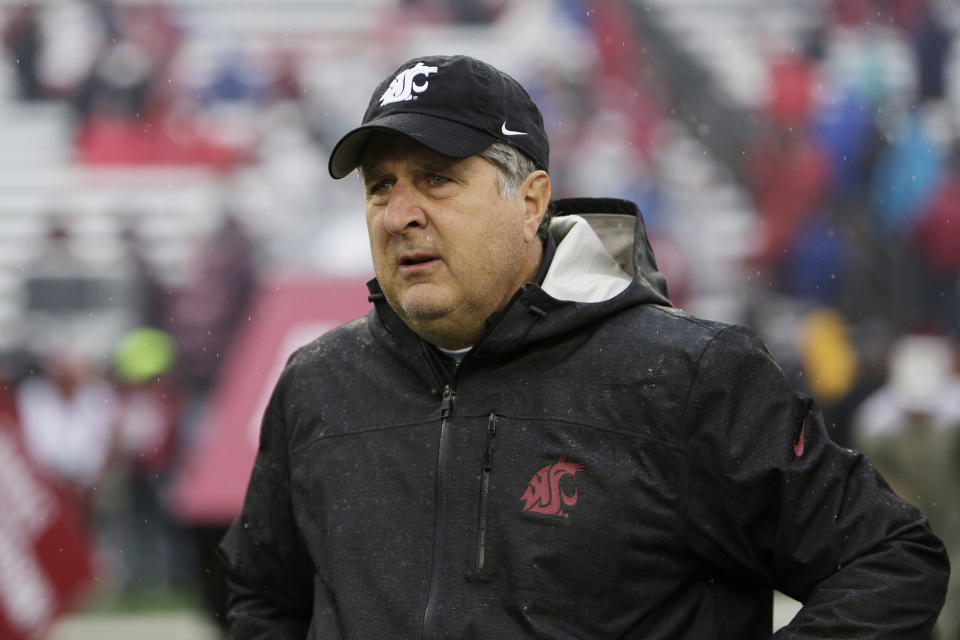 FILE - In this Oct. 19, 2019, file photo, Washington State head coach Mike Leach walks onto the field before an NCAA college football game against Colorado, in Pullman, Wash. Two people with knowledge of the decision says Mississippi State has hired Washington State's Mike Leach as its new head coach. The people spoke to The Associated Press on condition of anonymity Thursday, Jan. 9, 2020, because the school has not yet officially announced the move. Leach will replace Joe Moorhead, who was fired last week after two seasons. (AP Photo/Young Kwak, File)