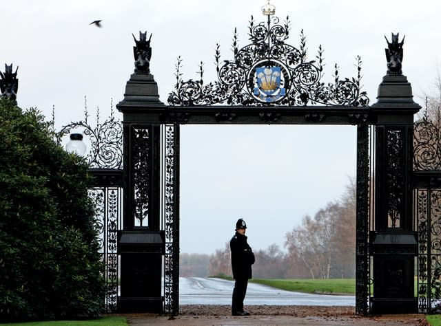 A police officer stands at the gates to Sandringham House (Chris Radburn/PA)