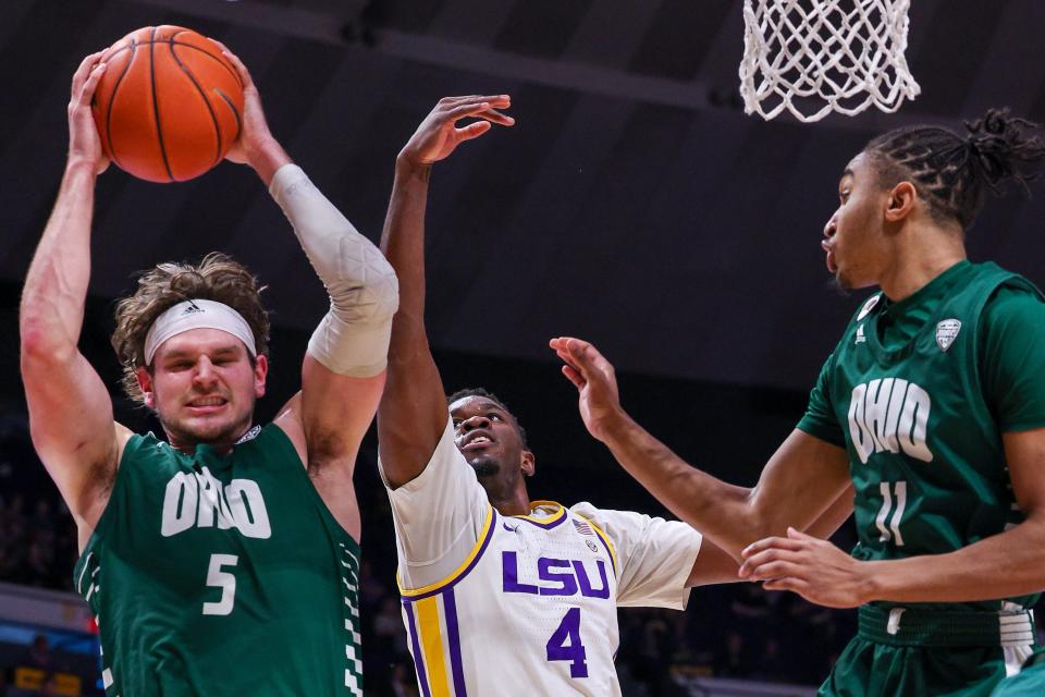 Dec 1, 2021; Baton Rouge, Louisiana, USA; Ohio Bobcats forward Ben Vander Plas (5) grabs a rebound away from LSU Tigers forward Darius Days (4) during the first half at Pete Maravich Assembly Center. Mandatory Credit: Stephen Lew-USA TODAY Sports