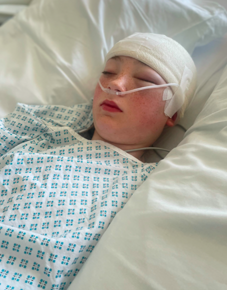 Neea Atkinson has been paralysed down her left hand side and is experiencing seizures. (SWNS)