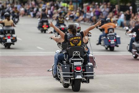 Harley riders participate in the Harley Davidson 110th Anniversary Celebration parade in Wisconsin Avenue, Milwaukee August 31, 2013. REUTERS/Sara Stathas