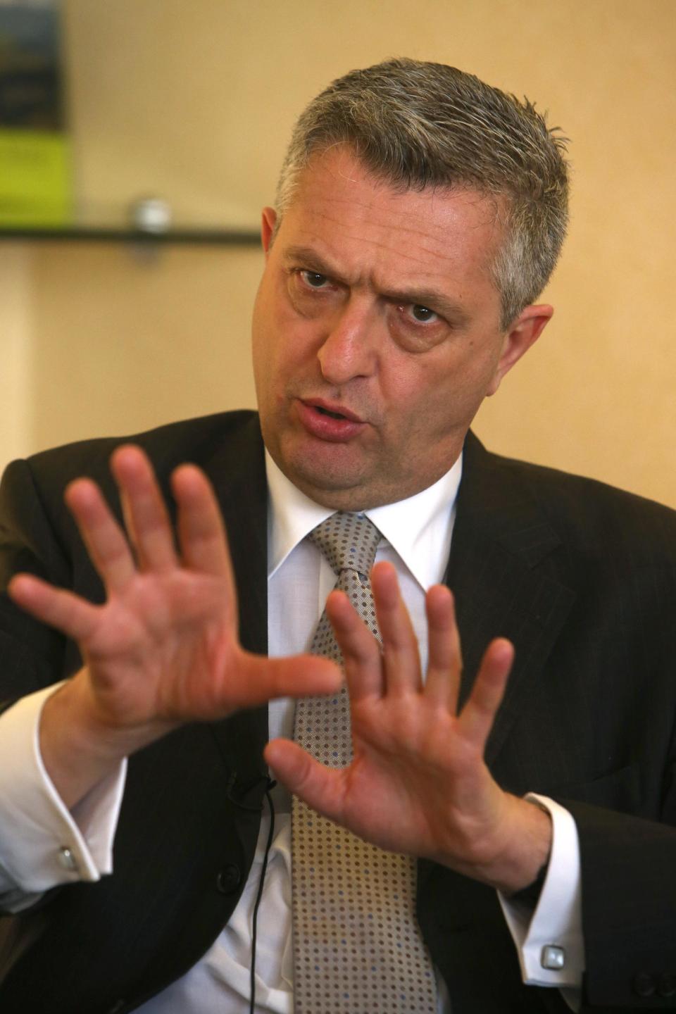 Filippo Grandi, the Commissioner General of UNRWA, speaks during an interview with the Associated Press, in Beirut, Lebanon, Tuesday, Feb. 25, 2014. A day after a rare visit to the besieged Palestinian camp of Yarmouk in Damascus, the chief of the United Nations relief agency supporting Palestinian refugees welcomed last week’s U.N. Security Council resolution calling for immediate access for humanitarian aid to all areas of Syria. Grandi said in Beirut that the resolution, unanimously adopted by the security council, “gives us a tool to argue in favor of access that is stronger than any other tool we’ve ever had before in Syria.” (AP Photo/Hussein Malla,Pool)