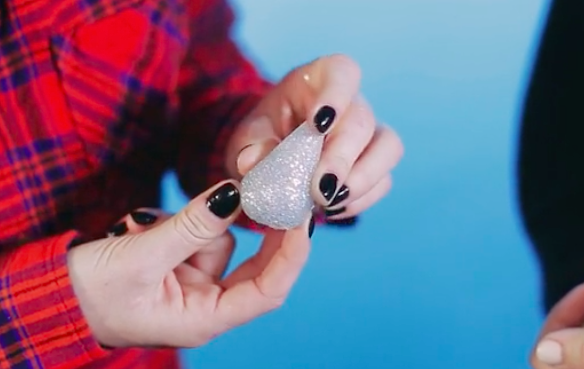 This innovative makeup sponge looks like glittery rock from outer space and we want it STAT