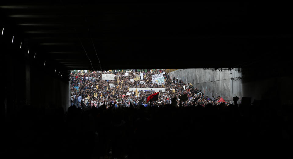 Students march in remembrance of the 1968 Tlatelolco student massacre, in Mexico City, Tuesday, Oct. 2, 2018. President-elect Andres Manuel Lopez Obrador has invoked social movements like the students of 1968, the Mexican Revolution and liberal reform President Benito Juarez in proposing what he calls the "fourth transformation" of Mexico, pledging an end to rule by wealthy, corrupt, out-of-touch politicians and businesses.(AP Photo/Eduardo Verdugo)