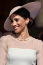 <p>At her first royal engagement since her wedding to Prince Harry, the Duchess of Sussex transformed her signature messy bun into a sleek and very regal side style.</p>