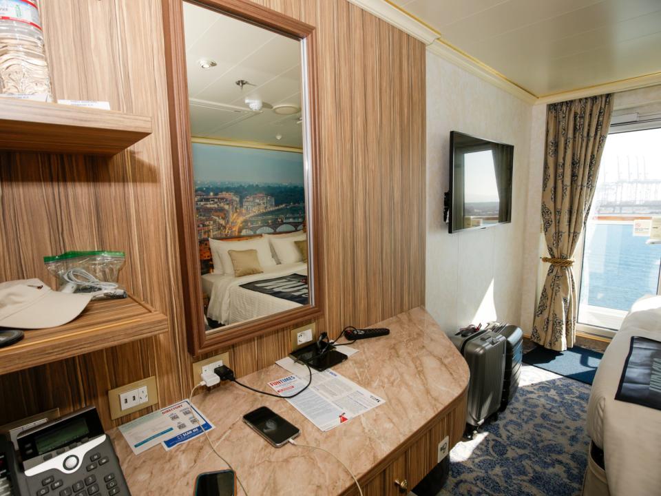 desk in balcony cabin on Carnival Firenze