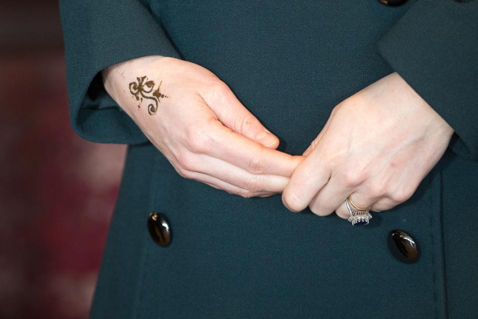 Pregnant Kate Middleton got a henna tattoo on a recent royal visit to Sunderland, England, with her husband, Prince William. The design featured a small flower.