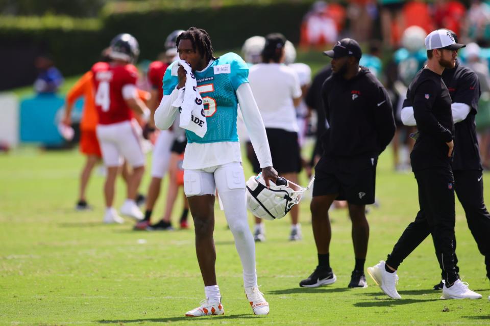 Aug 6, 2024; Miami Gardens, FL, USA; Miami Dolphins cornerback Jalen Ramsey (5) looks on during a joint practice with the Atlanta Falcons at Baptist Health Training Complex. Mandatory Credit: Sam Navarro-USA TODAY Sports