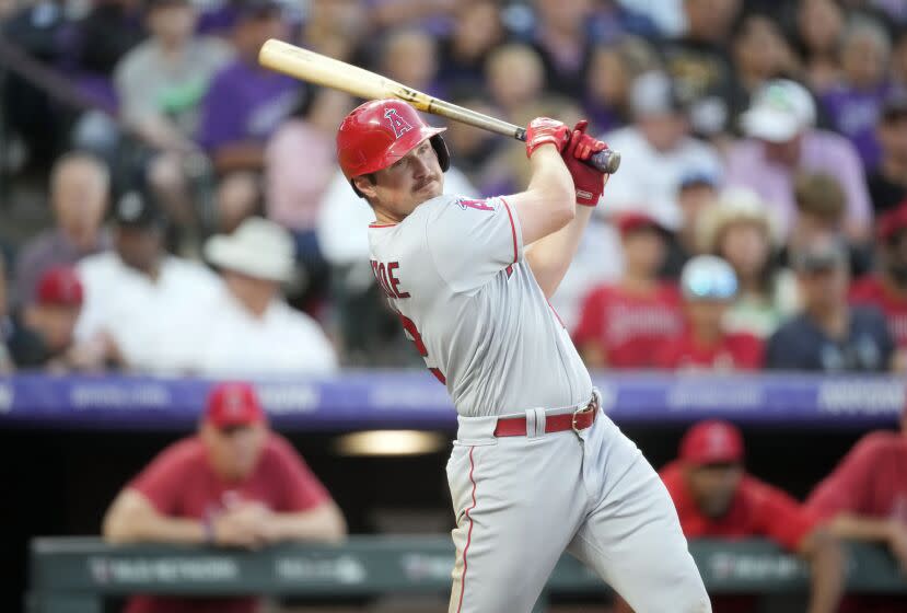 The Angels' Hunter Renfroe follows the flight of his double to drive in three runs