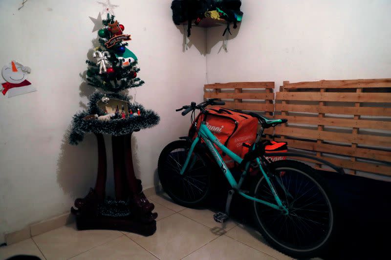 A Rappi's delivery box is seen next to a bicycle of Jetsymar Torres from Venezuela at her house in Bogota