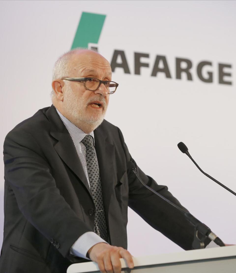 Rolf Soiron, Swiss cement maker Holcim chairman, delivers his speech during a press conference, Monday, April 7, 2014 in Paris. Holcim and French cement maker Lafarge announced plans for a "merger of equals" Monday that would create an industry giant with a combined euro32 billion (US$43.9 billion) in annual revenues. (AP Photo/Jacques Brinon)