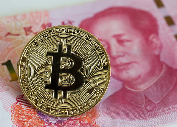 Even the Chinese government can’t stop people from using yuan to buy bitcoin. (Getty)