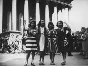 <p>A group of women dress in outfits representing the allied countries—the United States, France, Great Britain, and the Soviet Union—for a V-E Day celebration. </p>