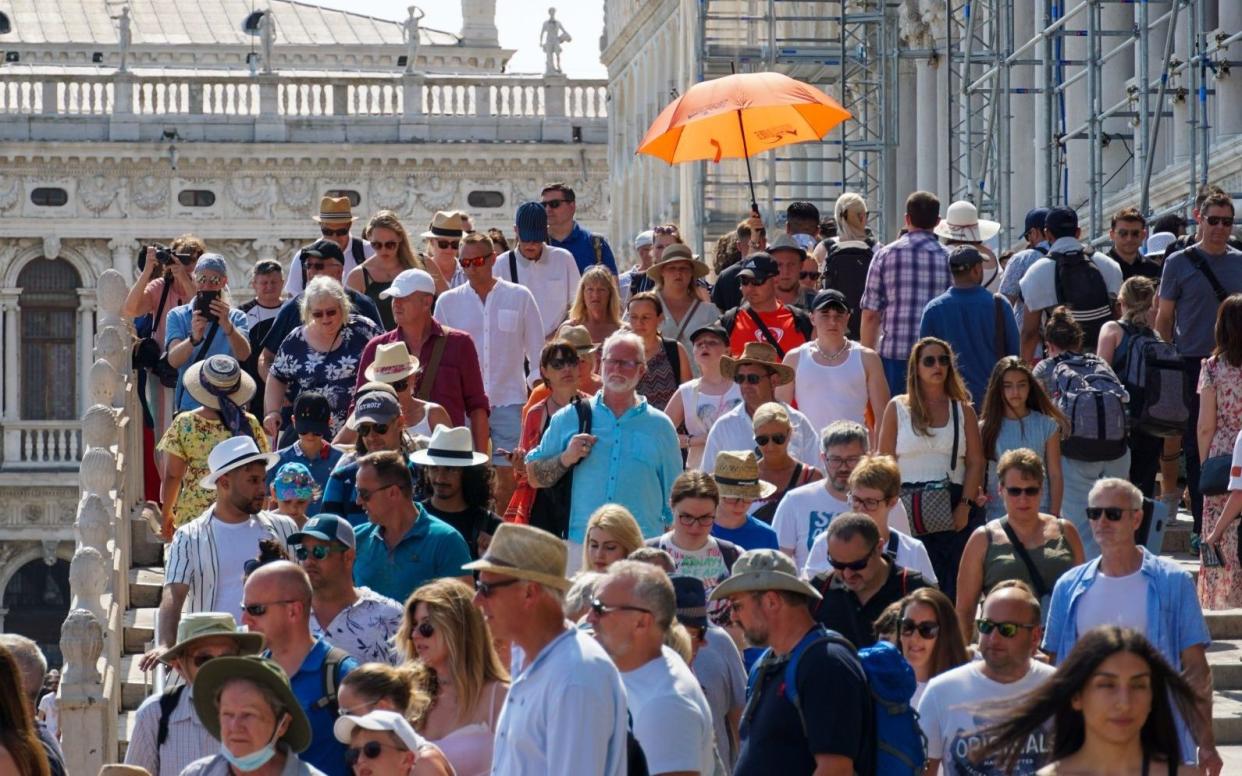 Crowds of tourists on the Ponte della Paglia footbridge in Venice - Bloomberg