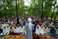 <p>Rohingya refugee people take part in Eid al-Adha prayer near the Kutupalang makeshift refugee camp, in Cox’s Bazar, Bangladesh, Sept. 2, 2017. (Photo: Mohammad Ponir Hossain/Reuters) </p>