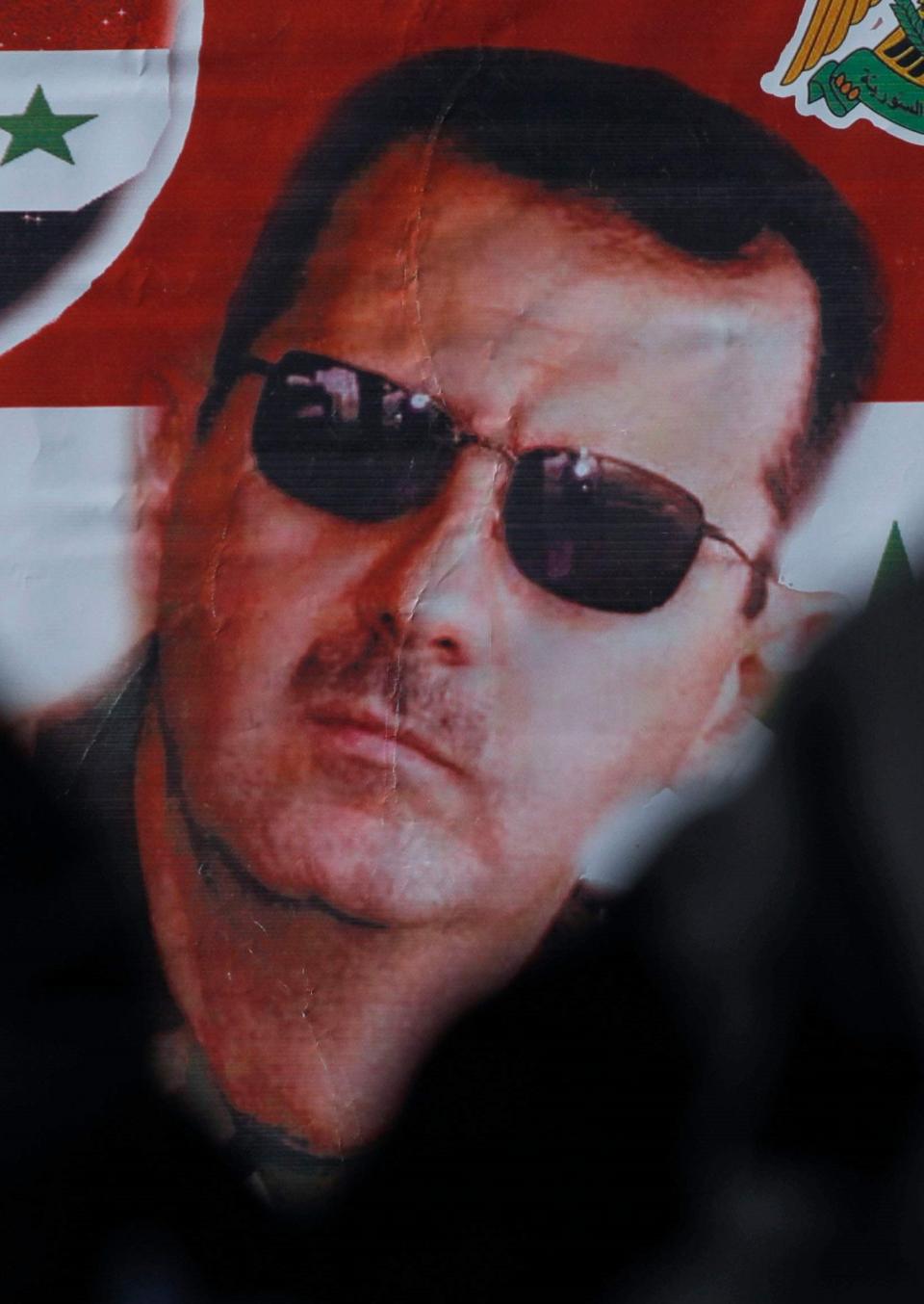 A billboard of Syrian President Bashar Assad (AFP via Getty Images)