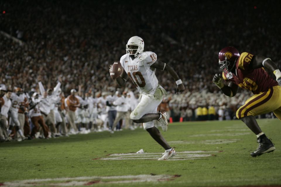 Texas quarterback Vince Young outruns the Southern California defense for the game-winning touchdown in the 2006 Rose Bowl in Pasadena, Calif.