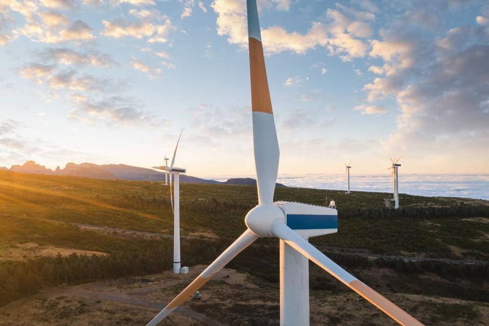 wind turbines at sunset