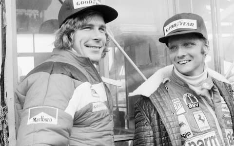 Niki Lauda, right, and James Hunt, of Britain, look at the rain before the start of the Japan Grand Prix Formula One, 1976 - Credit: AP/Nuck Ut