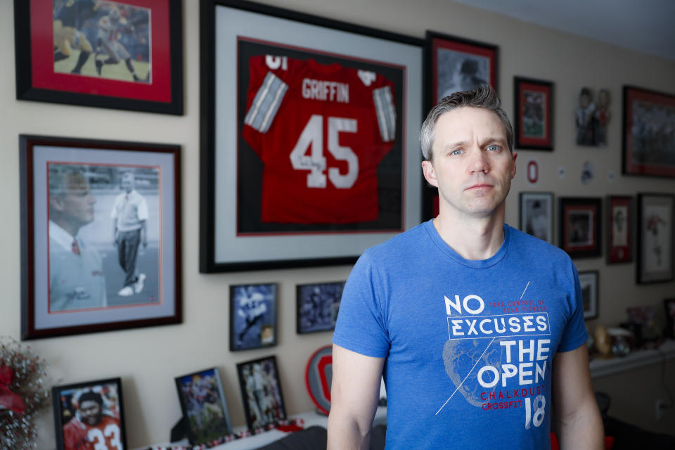 Brian Garrett stands for a portrait at his home, Saturday, May 18, 2019, in Powell. Ohio. Former nursing student Brian Garrett said he worked for a short time at an off-campus clinic Dr. Richard Strauss opened after he was ousted at Ohio State in the late 1990s. But Garrett quit after witnessing abuse by Strauss and then experiencing it himself. (AP Photo/John Minchillo)