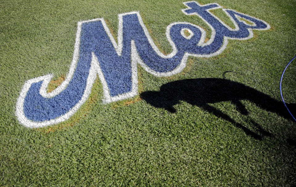 One Mets fan wants to take her prom photos at Citi Field. (AP Photo)