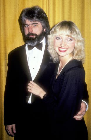 <p>Ron Galella, Ltd./Ron Galella Collection via Getty</p> Michael McDonald and Amy Holland in Los Angeles in February 1983