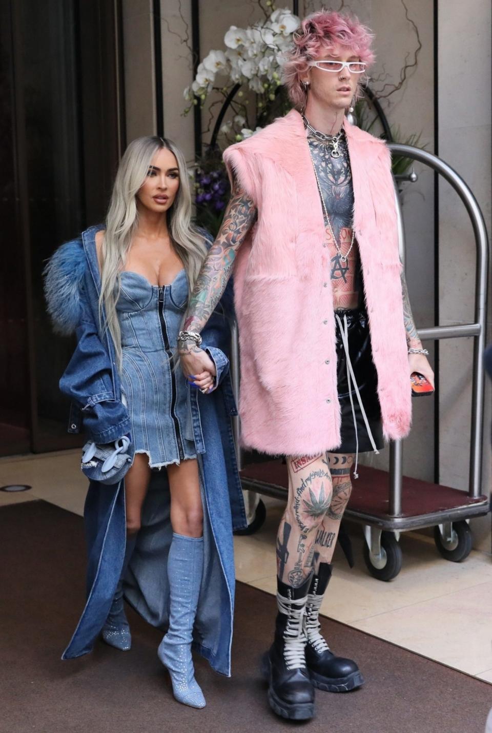 <p>Megan Fox and Machine Gun Kelly stand out from the crowds during a shopping trip in Paris on Sept. 29. </p>