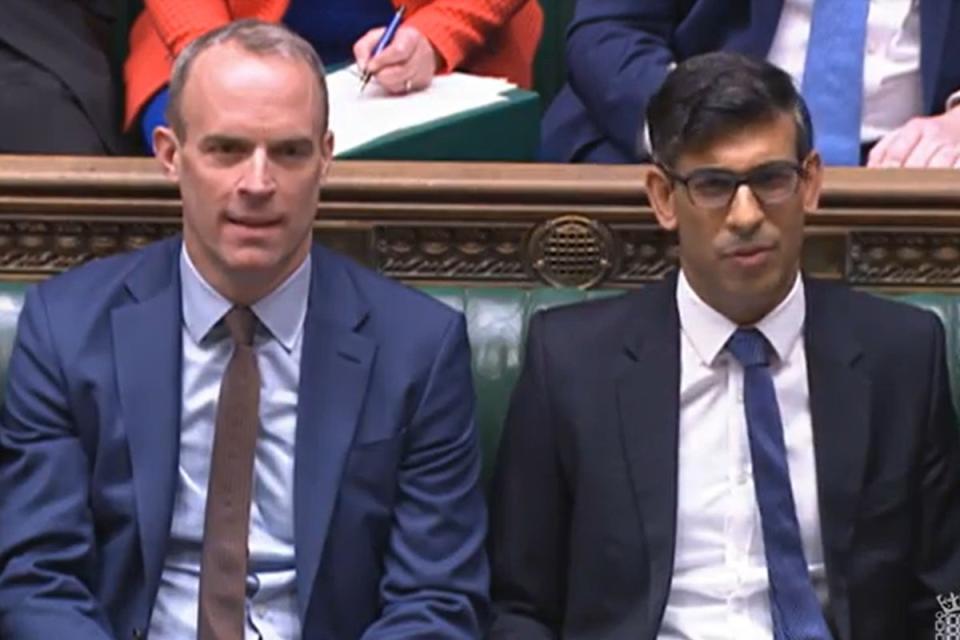 Dominic Raab and Rishi Sunak during yesterday’s Prime Minister’s Questions (PA)