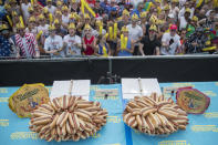 <p>Hot dogs are on display on stage ahead of the Nathan’s Famous Fourth of July hot dog eating contest, Wednesday, July 4, 2018, in New York’s Coney Island. (Photo: Mary Altaffer/AP) </p>