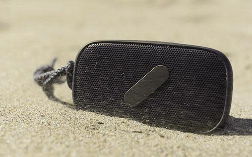 Super M speaker in sand