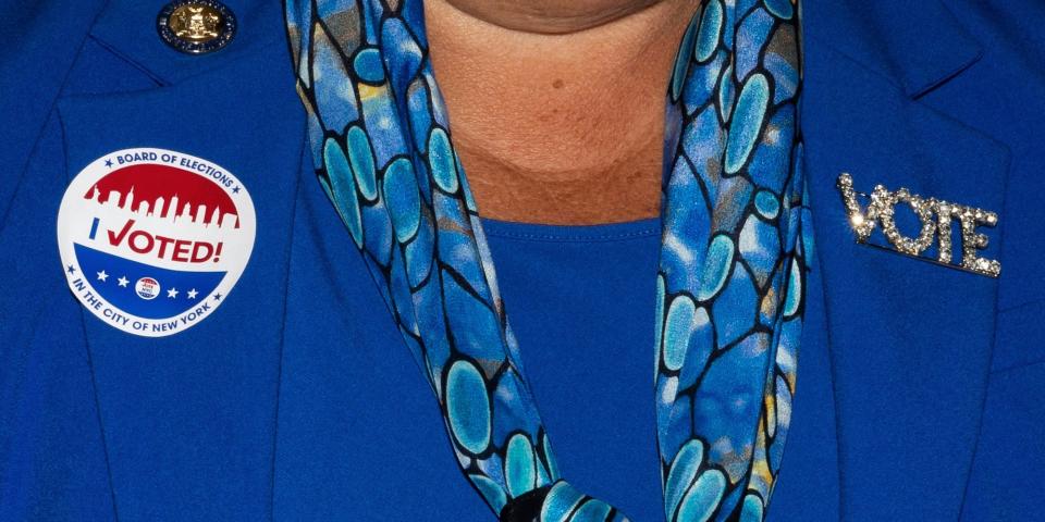 New York State Assembly member Rebecca Seawright wears an "I Voted" sticker and a "Vote" brooch at U.S. Rep. Carolyn Maloney's election night party, Tuesday, Aug. 23, 2022, in New York.