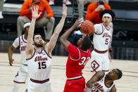 Ohio State forward E.J. Liddell (32) shoots over Illinois forward Giorgi Bezhanishvili (15) in an NCAA college basketball championship game at the Big Ten Conference tournament in Indianapolis, Sunday, March 14, 2021. (AP Photo/Michael Conroy)