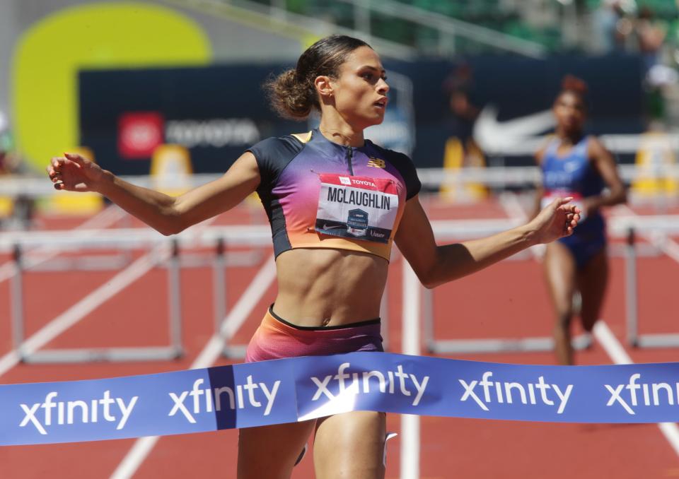 Sydney McLaughlin, center, wins the women's 400 meter hurdles on day three of the USA Track and Field Championships 2022 at Hayward Field in Eugene Saturday June 25, 2022.