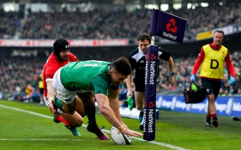 Jacob Stockdale crosses the try line - Credit: Brendan Moran/Sportsfile