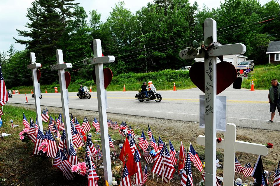 In this July 6, 2019, file photo, motorcyclists participate in a ride in Randolph, N.H., to remember seven bikers killed there in a collision with a pickup truck in June. State transportation officials in Massachusetts are expected to be questioned during a legislative oversight hearing on Monday, July 22, 2019, in Boston, about the Registry of Motor Vehicles' failure to suspend the commercial license of the truck driver charged in the crash that killed the seven motorcyclists in New Hampshire.