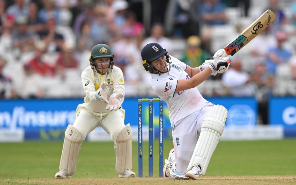 Natalie Sciver-Brunt in batting action watched by Alyssa Healy during day two of the LV= Insurance Women&#39;s Ashes Test match between England and Australia