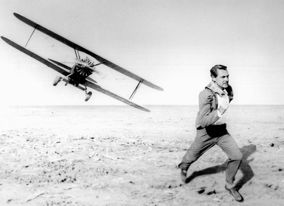 Cary Grant - Iconic scene from North by Northwest - Airplane chase - 1959