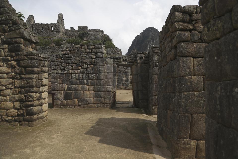 The Machu Picchu archeological site is devoid of tourists while it's closed amid the COVID-19 pandemic, in the department of Cusco, Peru, Tuesday, Oct. 27, 2020. Currently open to maintenance workers only, the world-renown Incan citadel of Machu Picchu will reopen to the public on Nov. 1. (AP Photo/Martin Mejia)