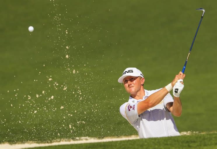 Mackenzie Hughes of Canada hits from a bunker on the second hole during Tuesday practice rounds for the 2017 Masters at Augusta National Golf Course in Augusta, Georgia, U.S., April 4, 2017. REUTERS/Brian Snyder